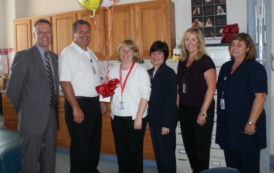 Katherine Robeson (center), is congratulated, for being named Maryland's School Nurse of the Year, by (left to right) Dr. Michael J. Martirano, superintendent of schools, Board of Education Chairman Bill Mattingly, Vice Chairman Cathy Allen, Andrea Owens, principal of Dynard ES, and Patricia Wince, SMCPS supervisor of health. (Submitted photo)