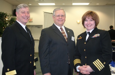 (L-R) Rear Admiral Patrick Lorge, Commandant, Naval District Washington, Charles County Commissioner President Wayne Cooper, and Captain Catie Hanft, Commanding Officer, Naval Support Activity South Potomac and Executive Committee Co-Chair of the South Potomac Community Relations Council, pose for a photo following the COMREL meeting on Feb. 25.