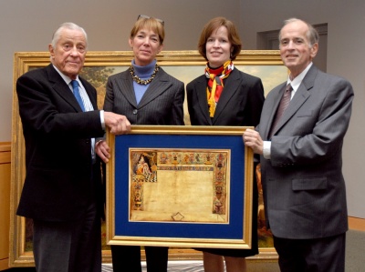 (From left to right) Benjamin Bradlee, SMCM president Jane Margret O'Brien, Executive Director for the Historic St. Mary's City Commission Regina Faden, and Martin Sullivan, director of the National Portrait Gallery at the Smithsonian Institution, stand behind the replica of the Patent of Nobility, presented to Bradlee during the Maryland Historical Society's Marylander of the Year ceremony. The reproduction was originally presented to George Calvert in 1624, 10 years before the founding of Maryland, and granted Calvert his title of "Lord." (Submitted photo)