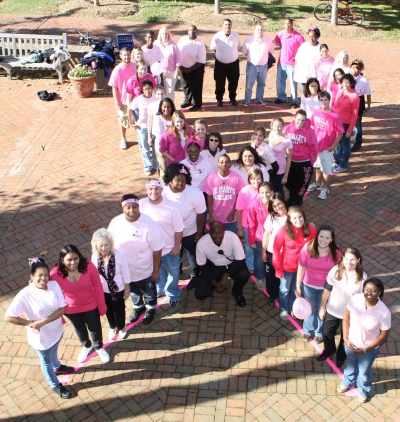 Students and faculty join for a group photo during Breast Cancer Awareness Day. (Photo: Bill Wood)