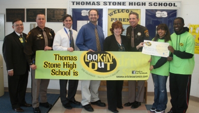 Thomas Stone High School received a grant for their teen driver safety task force. Accepting the check are, pictured from left, Ronald Cunningham, deputy superintendent; Of­ficer Raymond Anderson; Stone Vice Principal Carl Pas­carella; Stone teacher and SGA advisor Gary Winsett; Gina McElhaney of Strachan Insurance Agency; Sheriff Rex Coffey; and Stone seniors Ariel Queen and Emmanuel Bakare. (Submitted photo)