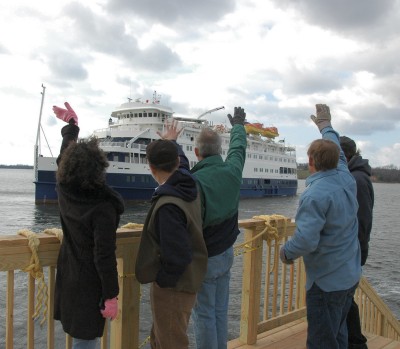St. Mary’s College of Maryland staff wave farewell Sunday to the Sea Voyager, which housed 240 SMCM students for almost two months. (Photo: Lee Capristo)
