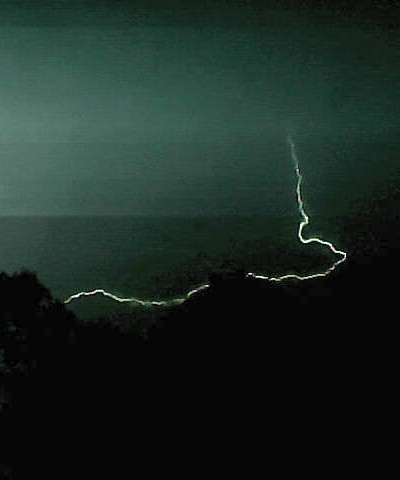 A security camera caught this lightning during the thunderstorm Friday night that knocked out power to tens of thousands across the region. (Photo: David Noss)