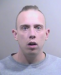 Lance Edward Crossley, age 34. Arrest photo.