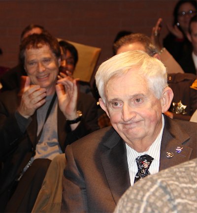 James E. Richmond, a former longtime Charles County Public Schools superintendent, reacts as he learns that the science center at St. Charles High School was named in honor of his efforts to bring STEM education to children in Charles County.