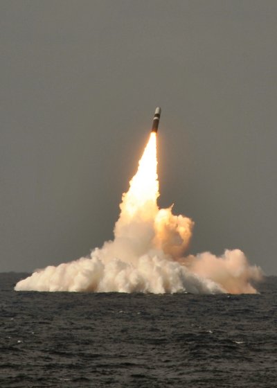 ATLANTIC OCEAN (June 2, 2014) - A Trident II D-5 ballistic missile is launched from the Ohio-class ballistic missile submarine USS West Virginia (SSBN 736) during a missile test at the Atlantic Missile Range. Navy Strategic Systems Programs (SSP) Director Vice Adm. Terry Benedict recently presented the SSP Director's Award to Patricia Fetter - a Naval Surface Warfare Center Dahlgren Division (NSWCDD) principal scientist - for her 31-year career impact on the Fleet Ballistic Missile Strategic Weapons System program's success. Fetter was honored for developing the first commercial-off-the-shelf based real time operating system for the Submarine Launched Ballistic Missile Strategic Weapons System. Benedict described her contributions as "fundamental to providing credible and affordable sea-based deterrent missile systems". (U.S. Navy photo/Released)