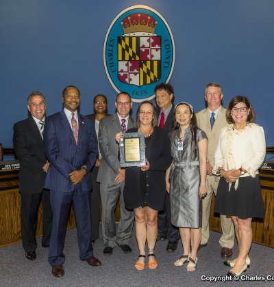 Pictured, left to right: Commissioner Bobby Rucci (District 4); Commissioner Reuben Collins (District 3); Commissioner Debra M. Davis, Esq. (District 2); Dave Eicholtz and Jacqueline Garland (Dept. of Fiscal and Administrative Services); Commissioner Ken Robinson (District 1); Holly Sun (GFOA State Representative); William DeAtley (Dept. of Fiscal and Administrative Services) and Commissioner President Candice Quinn Kelly.