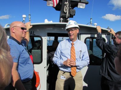 Dominion Vice President of Operations, Mr. Michael D. Frederick, hosts Leadership participants on a boat tour discussing Dominion's transition to exportation of liquefied natural gas. (Submitted photo)