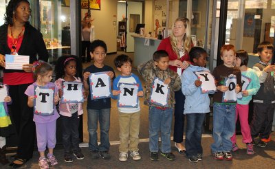 Kindergarten students at Dr. James Craik Elementary School spell out “Thank You” for veterans and members of the military who attended a special assembly and schoolwide parade on Nov. 11 to highlight American Freedom Week and Veterans Day.