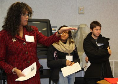 Howard County District Court Judge Pamila Brown, left, speaks with Thomas Stone High School students about the law, justice and freedom of speech in a cyber-age during a Civics and Law Academy held Dec. 2 at the school. More than 120 students participated in the event.