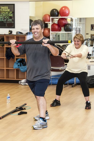 Tom Davis, left, and his wife Carol take fitness classes, such “The Amazing Ball” together at the College of Southern Maryland Leonardtown Wellness and Aquatics Center.