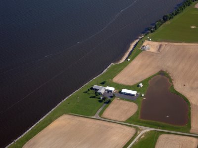 "This farm is located on the northern shore of Chesapeake Bay with no vegetative buffer in place to filter nutrients before they reach surface waters."—per caption on Flickr. (Photo Credit: Ben Longstaff, UMCES via Flickr)