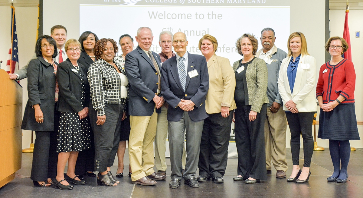 During the CSM Nonprofit Institute Conference, Herb Bailey of Lexington Park, center, was awarded Volunteer of the Year for his 1,400 hours volunteering at the Patuxent River Naval Air Museum. He is joined by members of the institute as well as volunteers recognized by the nonprofits they serve including, from left, Top Ladies of Distinction's Angela Thompson, Director of the Governor's Office on Service and Volunteerism Jeffrey Griffin, St. Mary's County Nonprofit Coordinator Harriet Yaffe, Top Ladies of Distinction's Janet Simmons, Charles County Mediation Center Volunteer Marie Bottoms, Top Ladies of Distinction's Diana Raynor, Health Partners Board President Kit Wright, Health Partners Treasurer Dan Sansbury, Bailey, Patuxent River Naval Air Museum Volunteer Coordinator Amy Houle Caruso, Charles County Mediation Center Coordinator Julie Walton, VConnections Volunteer Pete Williams, Maryland Governor's Office on Service and Volunteerism Representative Erin Lewis and CSM Strategic Partnerships Director Barbara Ives. (Photo: CSM)