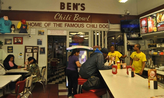Employees and customers at Ben's Chili Bowl in Washington, D.C., chat on Tuesday, May 10, 2016. Ben's Chili Bowl is considered a landmark of D.C. food culture and is known for its delicious chili and half-smokes. (Photo: Alana Pedalino)