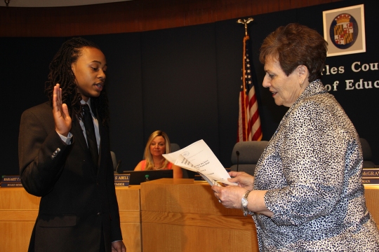 Da'Juon Washington, left, a rising senior at North Point High School is sworn in June 14 as the new Student Board Member by Board of Education Chairman Virginia McGraw, right. Washington will serve as the Student Board Member for the 2016-17 school year.