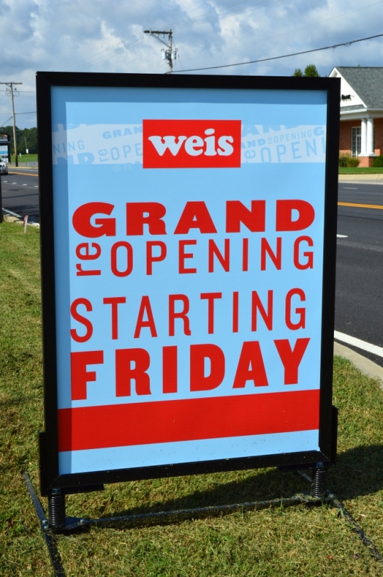 A temporary roadside sign in Callaway promotes the grand opening of the food retailer on Friday. The storefront sign has not been installed as of noon today.