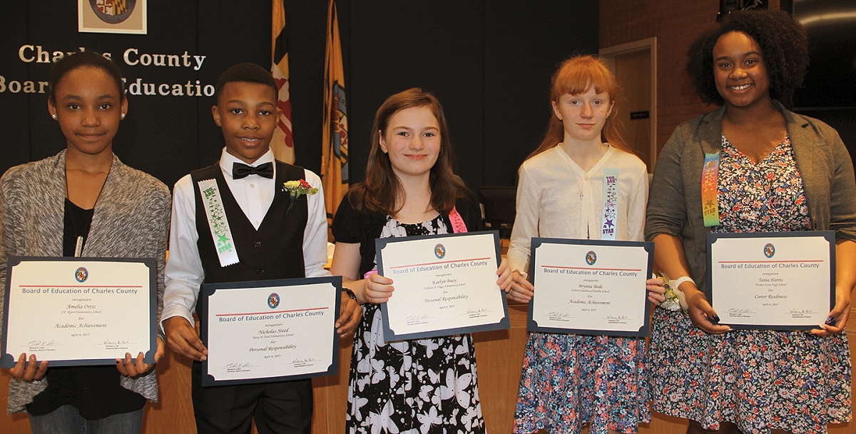 Charles County Public School students were honored during a recent Board of Education meeting for outstanding achievements. Among the students were Ameila Ortiz, a fifth-grade student at J.P. Ryon Elementary School, left; Nicholas Steed, a fifth grader at Mary B. Neal Elementary School; Kaelyn Buoy, a fifth-grade student at William A. Diggs Elementary School; Brynna Bode, an eighth grader at General Smallwood Middle School; and Tania Harris, a senior at Thomas Stone High School.
