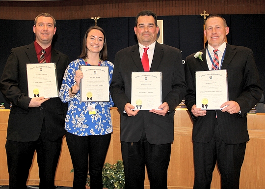 The Board of Education at its April 4 meeting honored four Charles County Public Schools exemplary employees for their commitment to children. Honored, from left, were Michael Johnson, science teacher at William A. Diggs Elementary School; Brittany Thomas, Life Skills teacher at J.P. Ryon Elementary School; Sean Anderson, mathematics teacher at General Smallwood Middle School; and Donald Mayer, an instructional assistant at Thomas Stone High School.