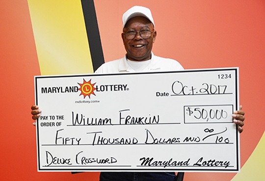 Bus driver William Franklin's favorite field trip was to Lottery headquarters to pick up his $50,000 Deluxe Crossword prize. (Photo courtesy Md. Lottery)