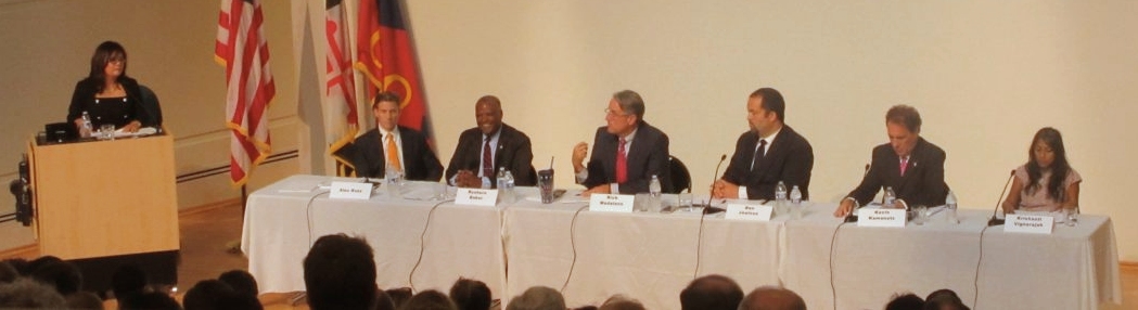 Democrats running for governor at Saturday's forum by United for Maryland. At the table from left: Alec Ross, Prince George's County Executive Rushern Baker, Sen. Rich Madaleno, former NAACP president Ben Jealous, Baltimore County Executive Kevin Kamenetz and former Michelle Obama aide Krish Vignarajah. Not attending were Maya Rockeymore Cummings and Jim Shea. (Photo: MarylandReporter.com)