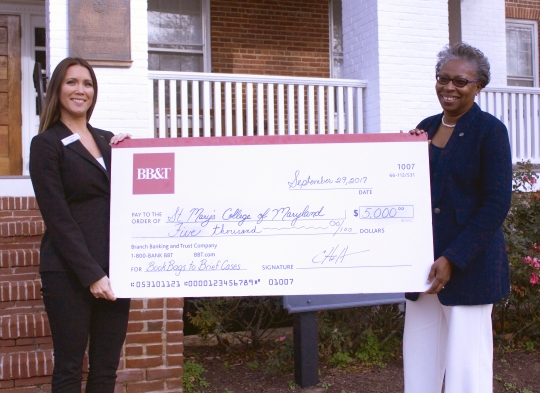Tuajuanda C. Jordan, president of St. Mary's College of Maryland (right), was pleased to accept a check recently for the Bookbag to Briefcase program from BB&T, the program's title sponsor.The check was presented by Elizabeth Snyder, vice president at BB&T, St. Mary's County region.
