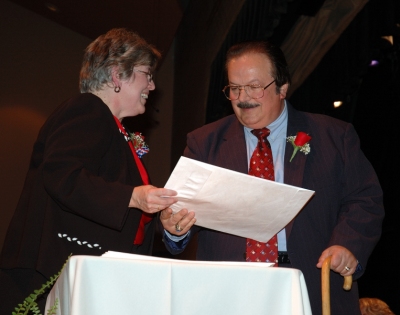 Sal Raspa just after signing the Oath of Office, administered by Clerk of the Circuit Court, Joan W. Williams, at the official swearing-in ceremony on Dec. 4. Photo David Noss.