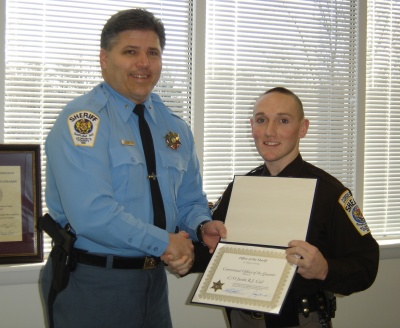 St. Mary's County Sheriff Timothy K. Cameron recognizes Correctional Officer Justin R. J. Cail as the Correctional Officer for the Third Quarter of 2007.