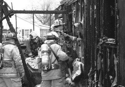 On Thursday, April 3, firefighters from Bay District, Lexington Park, Hollywood, St. Leonard, and Solomon’s put out a raging house fire that was caused by an exploding propane tank. (Photo: Andrea Shiell)