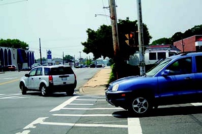 Intersections with pedestrian access like this one on Great Mills Road are part of the State Highway Administration’s new program to retrofit all crosswalks for ADA compliance. (Photo: Andrea Shiell)