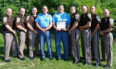 Pictured left to right: Michael Grimes, Jr.; Kenneth Flerlage; Austin Schultz; Lt. Michael Merican; Sheriff Timothy K. Cameron; Bryan Long; William Wood III; Wil Thompson, Joseph Faunce, Jr. (SMCSO Photo)