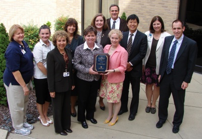 St. Mary's Hospital received the Delmarva Foundation Excellence Award at a ceremony on Sept. 3. Back row from left: Nancy Griffin, Physiology; Kristen McVerry, RN, Medical/Surgical/Pediatrics; Joy Homan, RN, Performance and Clinical Resource Management; President and CEO Christine R. Wray; Vice President Mark Boucot; Dr. Harold Lee; Vice President for Nursing MaryLou Watson; and Vice President for Finance Ric Braam. Front row from left: Vice President Joan Gelrud; Linda Dudderar, chairwoman of the Board of Directors; and Dr. Nancy Friedley, medical director of the Delmarva Foundation for Medical Care. (Submitted photo)