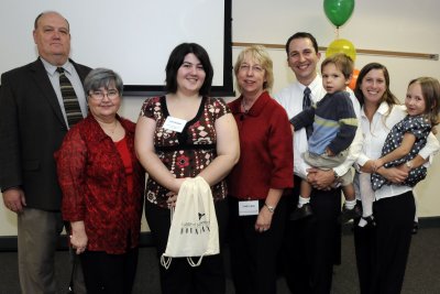 It was an extra bonus for Linda Smith and her family, that CSM student Lisa Walker, of Waldorf and recipient of the first Gary D. Smith Memorial Scholarship, had roots in Ohio as she and husband Gary had, and that Walker had attended Thomas Stone High School, as the Smith children had. From left are Walker’s parents Richard and Sue Walker, Walker, Linda Smith, Gabe Smith holding Ethan and Gabe’s wife Sara holding Madeline. (Submitted photo)