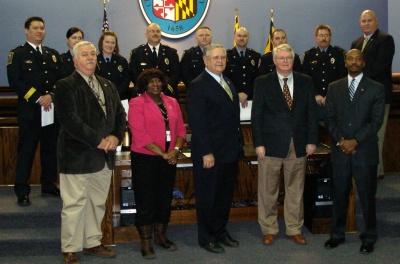 Back row L-R: Chief Filer, Medic Hiponia, EMT Fox, Chris Thompson, Medic Kidder, Medic Hayes, EMT Ellis, Medic Moore, ES Director William Stephens. Front row L-R: Commissioner Graves, Commissioner Patterson, Commissioner Cooper, Commissioner Hodge, Commissioner Collins.