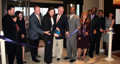 Charles County Commissioners Reuben B. Collins, II and Gary V. Hodge help representatives from the Marriott Hotel chain and the Charles County Chamber of Commerce to cut the ribbon officially opening the Courtyard by Marriott hotel in Waldorf. (Photo: George Clarkson)