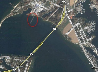 This satellite photo shows the relative location and size of the Navy pier in the Patuxent River (Circled in red). Map courtesy Google Maps.