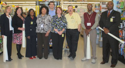 Seven Charles County public schools, in addition to several county private schools, received $3,000 grants through Dollar General's Literacy Foundation program. Pictured, from left, are J.C. Parks Elementary School Principal Kristin Shields, Mt. Hope/Nanjemoy Elementary School Vice Principal Diane Laveglia, General Smallwood Middle School Principal Cynthia Baker, Indian Head Elementary School Principal Toni Melton-Trainor, Jackson Routh, Community Initiatives Manager for Dollar General, Gale-Bailey Elementary School Principal Carrie Richardson, Bill Black, Bryans Road Dollar General store manager, Garland Foreman, administrator of Potomac Heights Christian Academy, and James Short, principal of Henry E. Lackey High School. (Submitted photo)