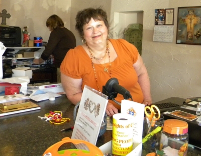 Pat Copsey at the cash register during the grand opening of Heavenly Presents in Leonardtown. (Photo: County Times)