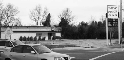 After years of deterioration a local developer has cleaned up a long abandoned gas station in Great Mills. The sign still displays $1.63 for unleaded gasoline. (Photo: County Times)