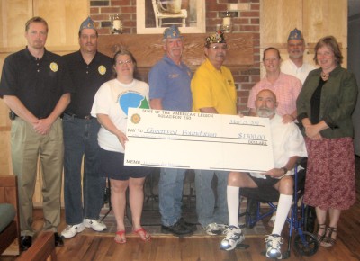 Pictured (left to right): Stephen Kemmer and Tim Petschk of the Sons of American Legion Post 293, Connie Pennington, President of the Board of Directors of Southern Maryland Vacations for Vets, Jeff Levesque and Kenny Lake Sr., of the Sons of American Legion Post 293, Gene Lane (seated) Greenwell Foundation board member, Colleen Lane, Greenwell Foundation board member, Ed Warren of the Sons of American Legion Post 293, and Jolanda Campbell, Greenwell Foundation executive director. (Submitted photo)