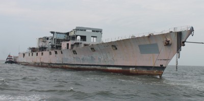 Ex-Navy Destroyer Radford is being maneuvered into position by two tugs in order to be sunk so it can be used as part of the multi-state artificial reefing effort. More photos at http://somd.me/q4LxSl. (Photo: Gary Cooke)