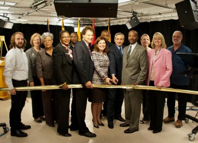 The Charles County Commissioners and County Administrator Dr. Rebecca Bridgett (second from right), along with CSM President Dr. Bradley Gottfried (fifth from right), CSM Board of Trustees member Dorothea Smith (third from left), and CSM students and staff to cut the ribbon marking the opening of a public access studio at the College of Southern Maryland's La Plata campus. (Photo: Valerie Nyce, CSM)
