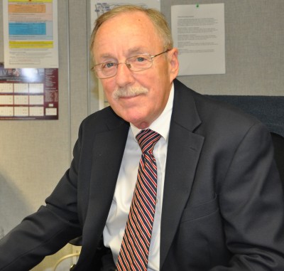 Robert Ashley, NSWCDD Contracting Office Acquisition Policy Lead (pictured in his office), was honored with a NAVSEA Excellence Award for his accomplishments, including the establishment of best practices implemented across the contracting competency. Ashley and members of two NSWCDD teams were among individuals and teams from across the NAVSEA organization who received awards for their excellent contributions to the United States Navy and to their commands at a ceremony held in Washington D.C. Dec. 7.