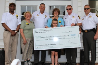 From left to right are: Mr. Bill Smith (CAASA), Ms. Linda Bowman (CAASA), Mrs. Candice D'Agostino (CAASA), Ms. Alaina D'Agostino, Sheriff Mike Evans, Lieutenant Colonel Thomas Hejl, and Lieutenant Dave McDowell.