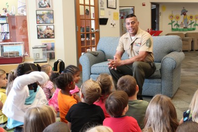 CSM elementary education student Vincent Juarez, who retired from the Marine Corps in 2009, was the Celebrity Reader at the St. Charles Childrens Learning Center on the La Plata Campus of the College of Southern Maryland May 23. Juarez drew on his teacher education training as he patiently listened as the talkative 3- to 5-year-olds shared with him their favorite colors, the favorite colors of their parents, best friendsand even their petsas he read Percival the Plain Little Caterpillar, by Helen Brawley.