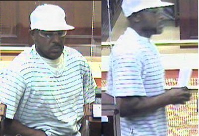 Police are searching for this man who robbed the Capitol One Bank located at 3068 Waldorf Market Place in Waldorf on July 21. (Bank Surveillance Photos)