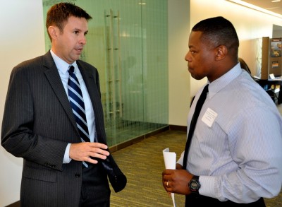 Naval Surface Warfare Center Dahlgren Division (NSWCDD) Deputy for Small Business Kris Parker speaks with II Corps Consultants, Inc., executive Earnest King at the command's Small Business Opportunities Fair and Conference. NSWCDD received the 2012 Office of Small Business Programs Sarkis Tatigian award for outstanding small business programs by a Naval Sea Systems Command field activity, the NAVSEA Small Business Programs Office announced May 22. “We create an organizational climate that advances small business opportunities through well-managed small business programs and challenging initiatives,” said Parker.