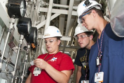 NET graduate and current CENG employee Tara Wille, left, spends time with current NET students Chad Delahay, of Loveville, and Jamie Yost, of Lusby, during their summer internship at Calvert Cliffs Nuclear Power Plant. Yost learned of the program from Calvert Career Center instructor and CSM NET instructor DeWeese Butler, and also from his older brother Jack Yost who graduated with an associate's degree in Nuclear Engineering Technology from CSM last May and was hired by CENG in July. (Photo: CSM)