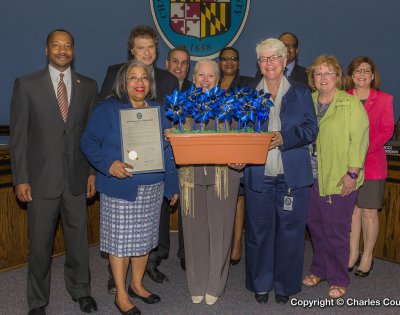 The Charles County Board of Commissioners present Child Abuse Prevention Month proclamation. Pictured, left to right: Commissioner Vice President Reuben B. Collins, II (District 3); Dianna E. Abney, M.D. (health officer, Charles County Department of Health); Commissioner Ken Robinson (District 1); Commissioner Bobby Rucci (District 4); Cathy Myers (Center for Children); Commissioner Debra M. Davis, Esq. (District 2); Therese Wolf (director, Charles County Social Services); James Bridgers (deputy health officer, Charles County Department of Health) ; Tina O'Neil (nurse, Charles County Department of Health); Commissioner President Candice Quinn Kelly.
