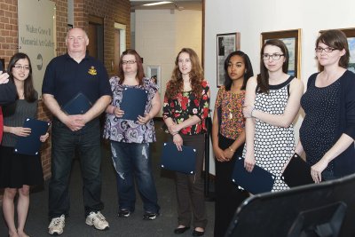 College of Southern Maryland Student Juried Art Show winners, from left, Mariko Sakemi of Lexington Park, Alan Frampton of Mechanicsville, Susan Grubaugh of La Plata, Jessica Lynch of Leonardtown, Candice Washington of Waldorf, Ashley Saldana of La Plata and Katharina Fleming of Hollywood hold their certificates at the show’s Gallery Talk held in the Fine Arts (FA) Building at the La Plata campus on April 15.