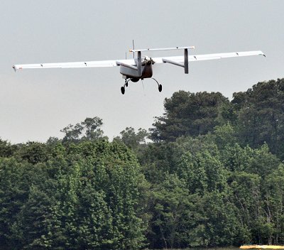 The Aerostar Unmanned Aerial System takes off during testing at Naval Support Facility Dahlgren during testing May 22. The test was the first fixed-wing flight from Dahlgren's runway in more than a decade and represented several months of preparation between the base, the Naval Surface Warfare Center Dahlgren Division, the Unmanned Aerial Systems Test Directorate, Naval Air Warfare Center Aircraft Division and the FAA. (U.S. Navy photo by Andrew Revelos/Released)